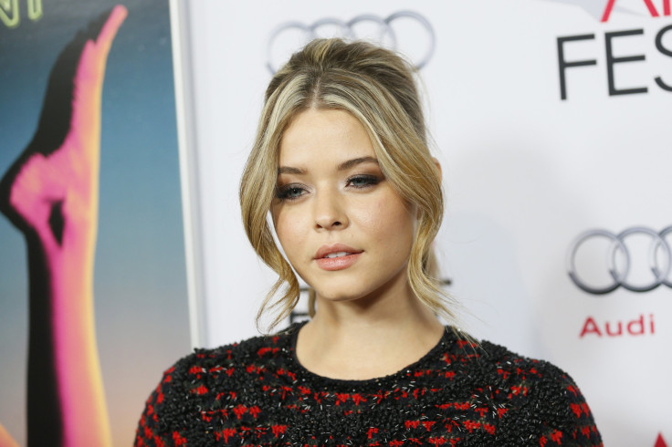 Actress Sasha Pieterse poses at the "Inherent Vice" gala screening during AFI Fest 2014 in Hollywood, California November 8, 2014. 