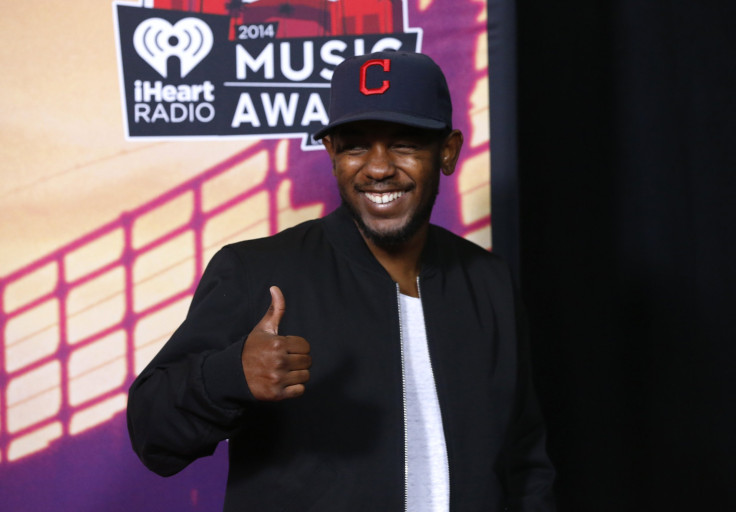 IN PHOTO: Hip hop recording artist Kendrick Lamar poses backstage during the iHeartRadio Music Awards in Los Angeles, California May 1, 2014.   