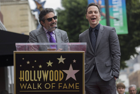 Actor Jim Parsons (R) laughs, as television producer Chuck Lorre speaks, before unveiling his star on the Hollywood Walk of Fame in Los Angeles