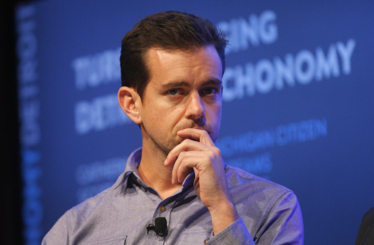 Jack Dorsey, chairman of Twitter and CEO of Square, listens to a fellow panelist during a Techonomy Detroit panel discussion