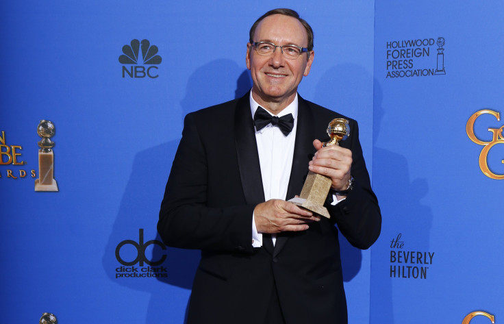 Actor Kevin Spacey poses backstage with his award for Best Performance by an Actor in a Television Series for "House of Cards"