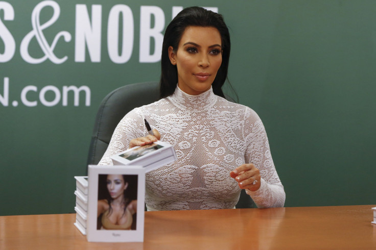 [12:30] Kim Kardashian signs copies of her book 'Selfish' at Barnes & Noble in New York