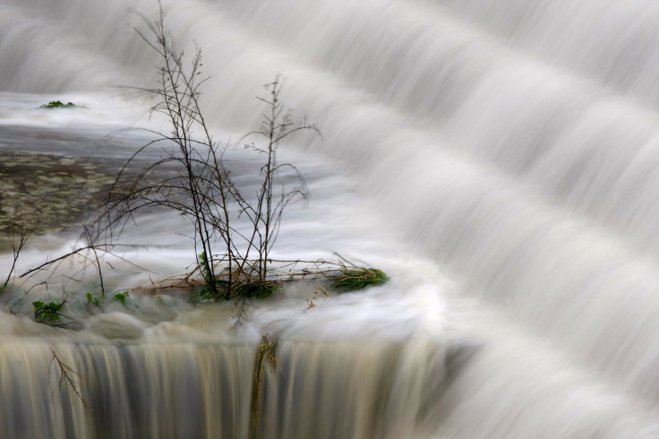 Water pours over one of the dams at Chadwick Lake