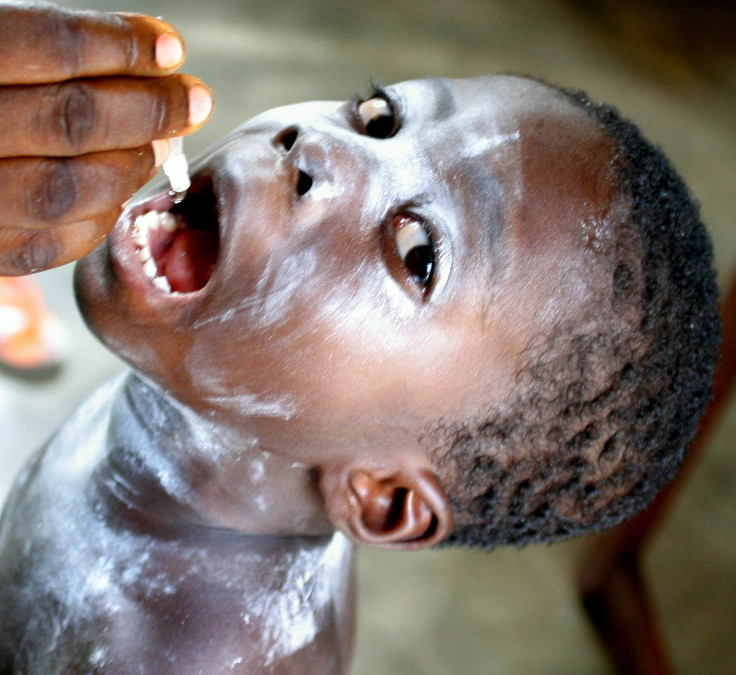 Treating Polio with vaccine at Nigeria