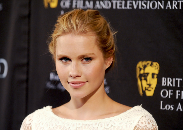 Actress Claire Holt arrives at the British Academy of Film and Television Arts Los Angeles  awards season Tea Party in Los Angeles, California, January 12, 2013. 