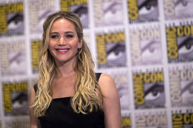[10:34] Cast member Jennifer Lawrence poses at a press line for 'The Hunger Games: Mockingjay - Part 2'