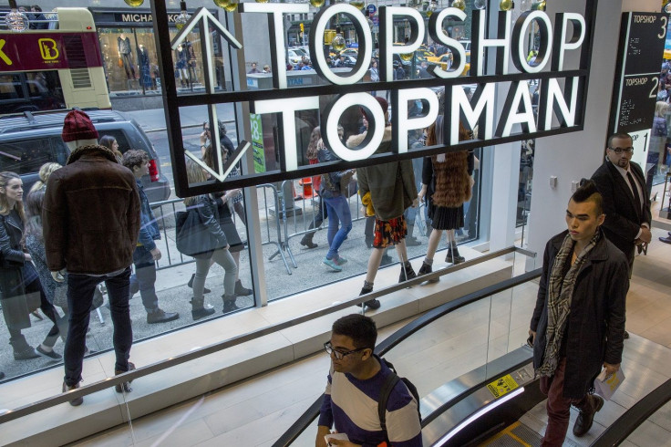 Shoppers are seen during British clothing retailer Topshop's grand opening of the chain's New York flagship store, November 5, 2014.