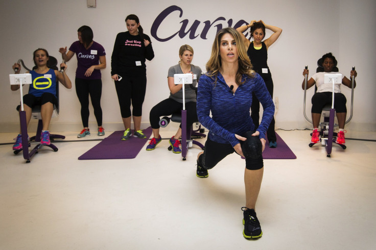Fitness guru Jillian Michaels gives exercise instructions while promoting her new workout for the Curves franchise in New York January 15, 2014.