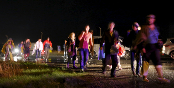 Migrants arrive at the Austrian-Hungarian border 