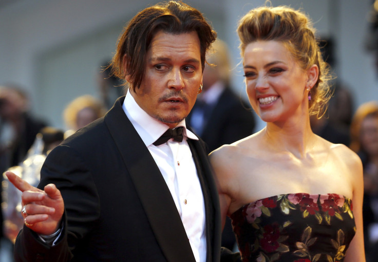 Actress Amber Heard and her husband Johnny Depp