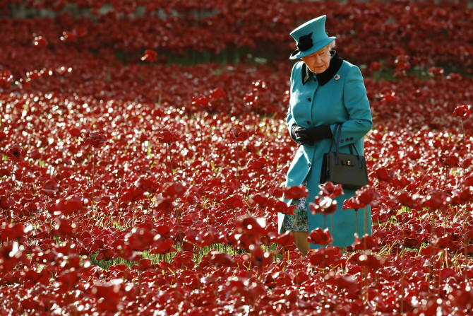 [10:48] Britain's Queen Elizabeth walks through a field of ceramic poppies