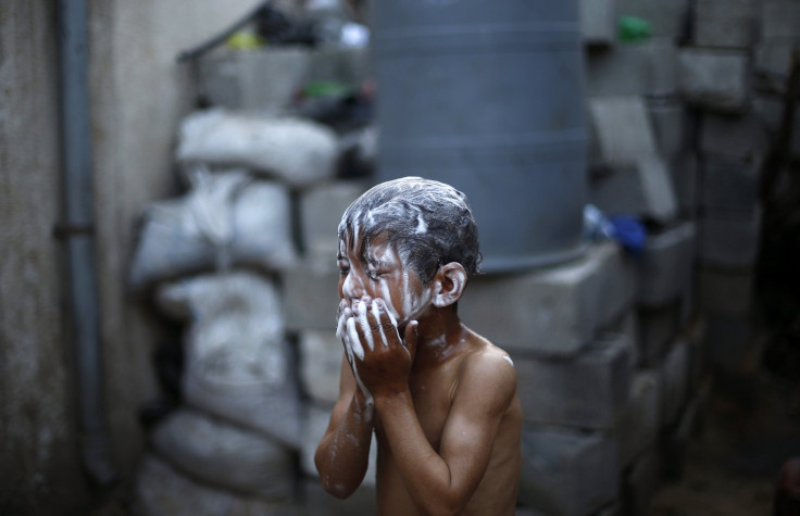 Boy taking a bath