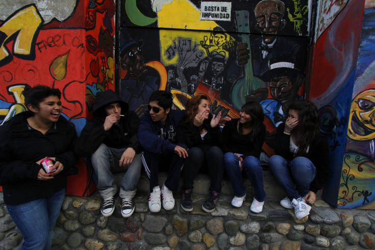 Teens smoking cigarette