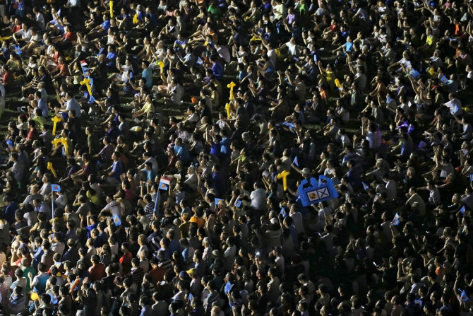 People attend an election campaign rally by the opposition Workers' Party in Singapore September 6, 2015.