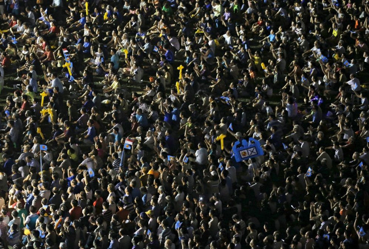 People attend an election campaign rally by the opposition Workers' Party in Singapore September 6, 2015.