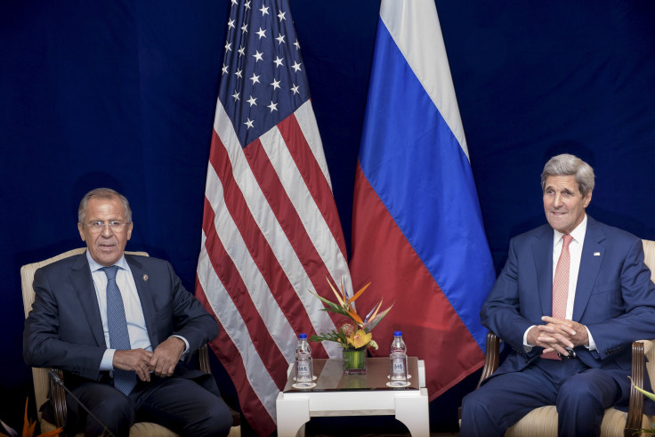 Russia's Foreign Minister Sergei Lavrov (L) and U.S. Secretary of State John Kerry