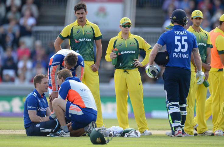 Eoin Morgan gets treatment after being struck by a bouncer