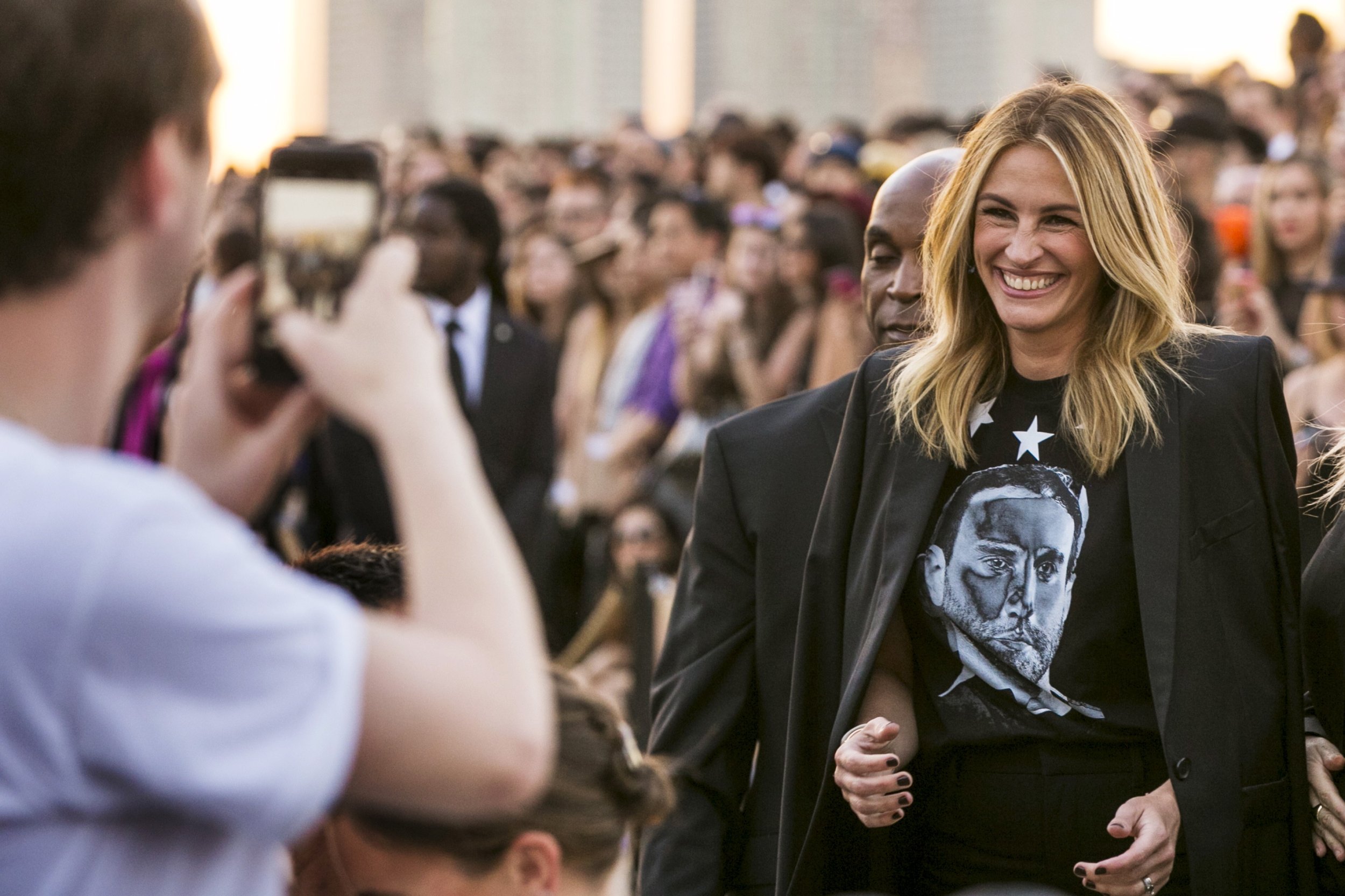 1430 Actress Julia Roberts greets attendees as she arrives for a presentation of the Givenchy SpringSummer 2016 collection