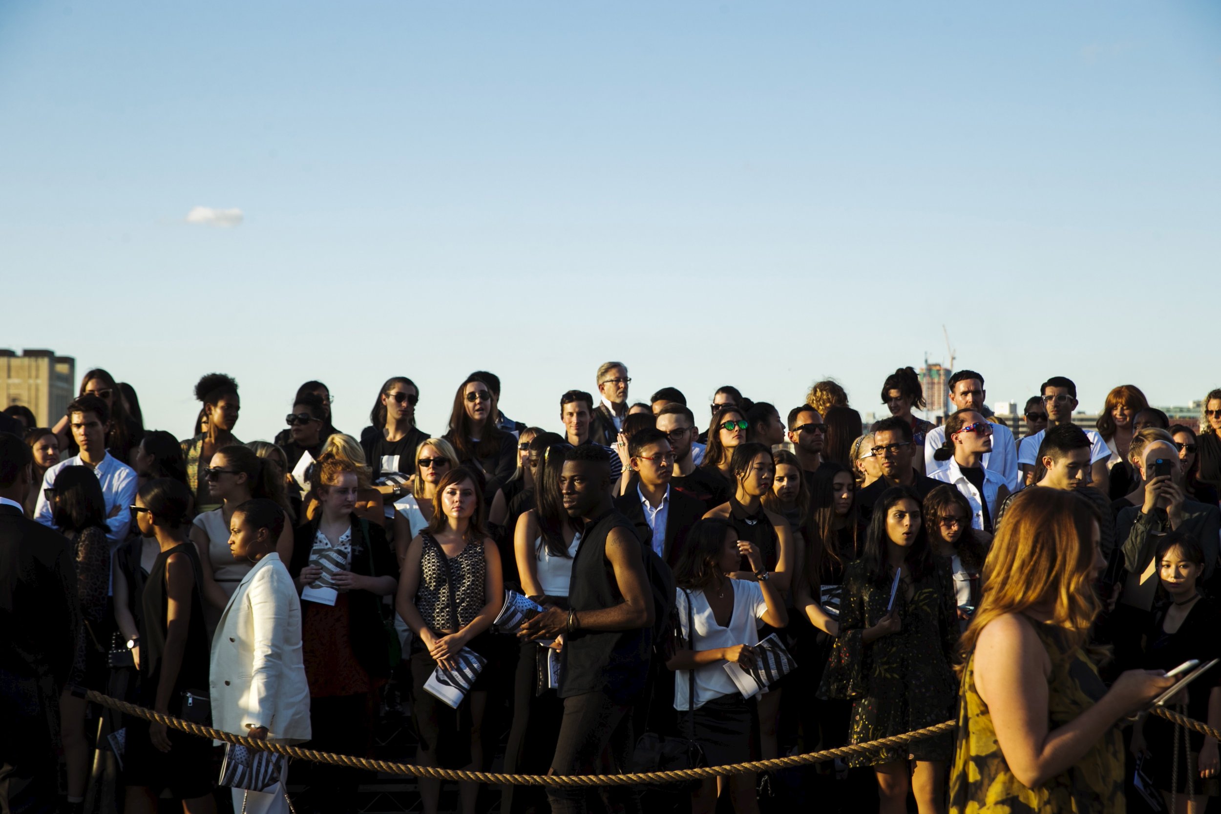 1523 Members of the audience wait to see a presentation of the Givenchy SpringSummer 2016 collection