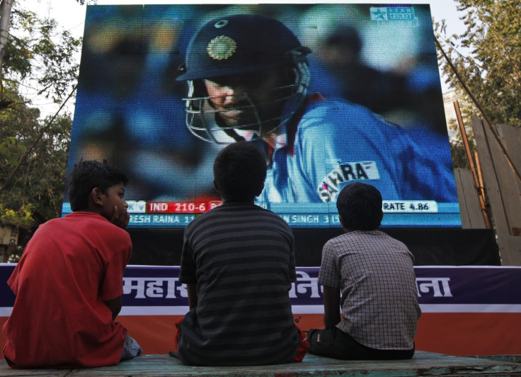 Children watching cricket