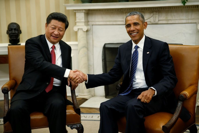 Obama greets Chinese President Xi Jinping