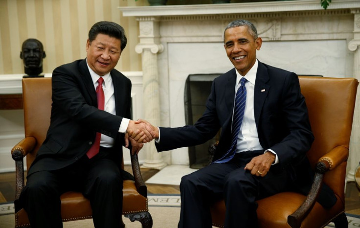 Obama greets Chinese President Xi Jinping