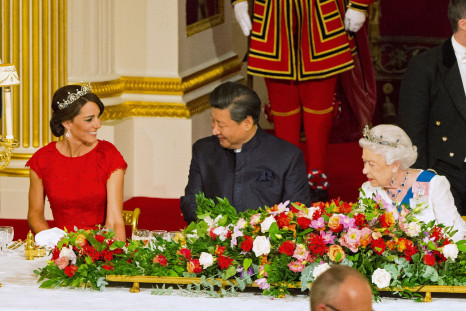 Chinese President Xi Jinping with the Duchess of Cambridge and Queen Elizabeth II at a state banquet at Buckingham Palace, London, during the first day of his state visit to Britain. Tuesday October 20, 2015. 