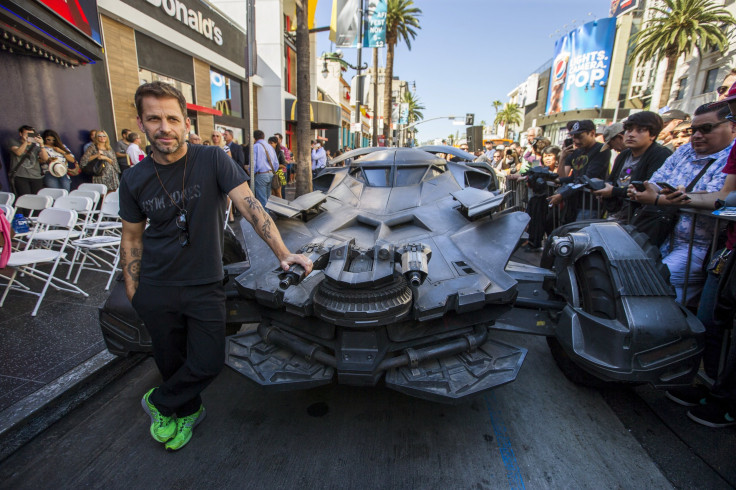 Director Zack Snyder poses by a Batmobile used in the movie "Batman v Superman: Dawn of Justice" before posthumously unveiling the star of Batman creator Bob Kane on the Hollywood Walk of Fame in Los Angeles, California October 21, 2015. 