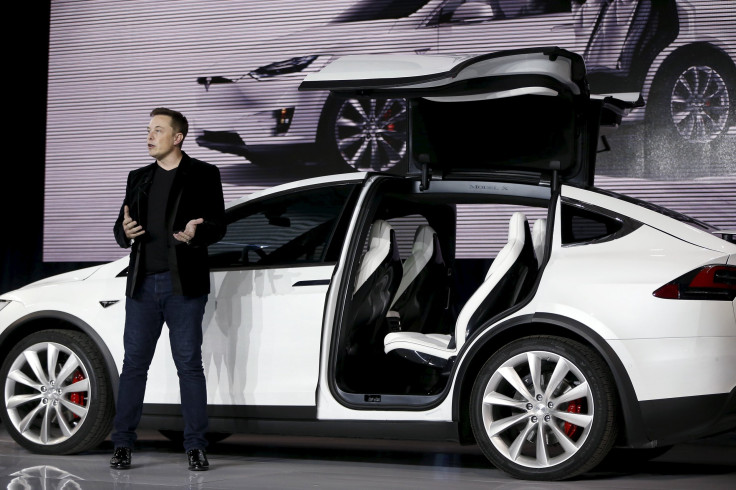 Tesla Motors CEO Elon Musk introduces the falcon wing door on the Model X electric sports-utility vehicles during a presentation in Fremont, California September 29, 2015. 