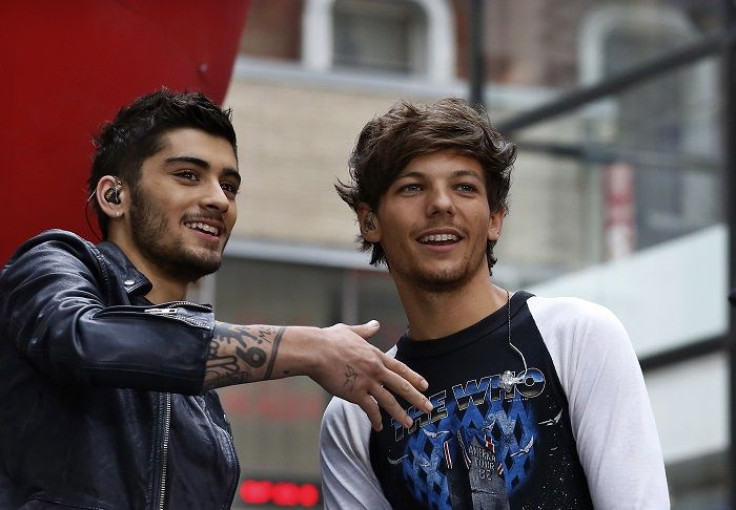 Zayn Malik (L) and Louis Tomlinson 