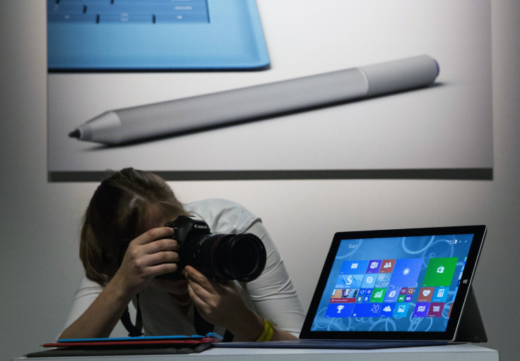 An attendee photographs the new Microsoft Surface Pro 3, during the event in New York May 20, 2014.