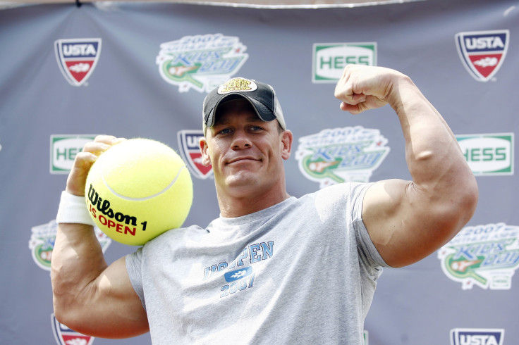 Wrestler Cena poses for photographers during 'Arthur Ashe Kid's Day' at the U.S. Open