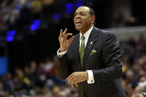 Hollins yells to his players during their NBA basketball game