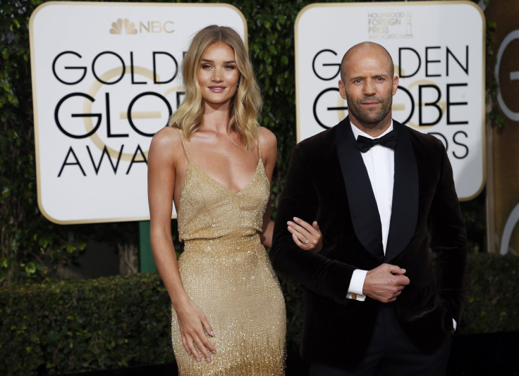 Rosie Huntington-Whiteley and Jason Stratham arrive at the 73rd Golden Globe Awards 