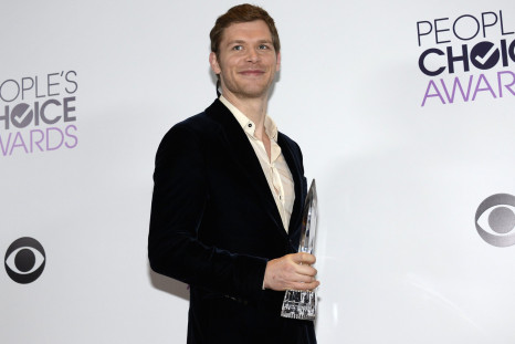 Joseph Morgan poses with the award he won for favorite actor in a new TV series for his role in "The Originals"
