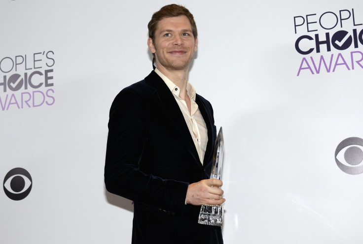 Joseph Morgan poses with the award he won for favorite actor in a new TV series for his role in "The Originals"