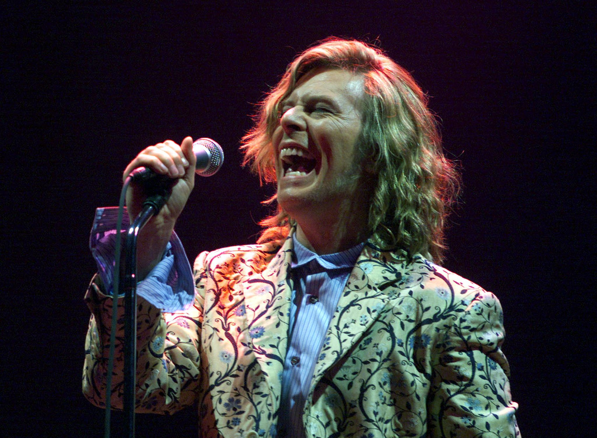 Rock star David Bowie, shown performing at the Glastonbury Festival