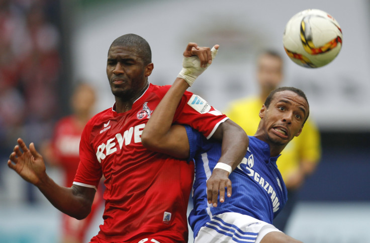 Schalke 04's Matip (R) challenges 1.FC Cologne's Modeste during their Bundesliga first division soccer match 