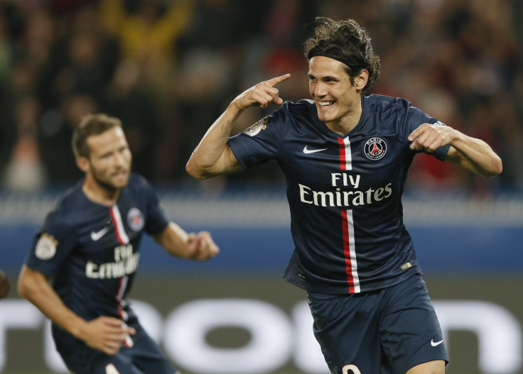 Paris St Germain's Cavani reacts after he scored against Olympique Lyon during their French Ligue 1 soccer
