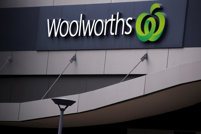 A Woolworths Ltd sign hangs above the entrance of a store in Sydney, Australia June 18, 2015.
