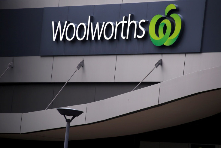 A Woolworths Ltd sign hangs above the entrance of a store in Sydney, Australia June 18, 2015.
