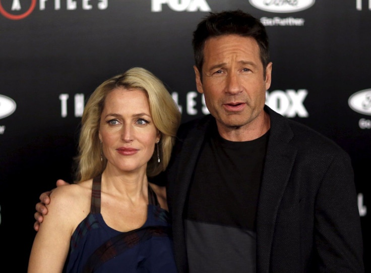 Cast members Gillian Anderson and David Duchovny pose at a premiere for "The X-Files"