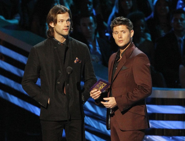 Presenters Jared Padalecki and Jensen Ackles of the television series "Supernatural" present the award for "Favorite Band" at the 2013 People's Choice Awards in Los Angeles, January 9, 2013.