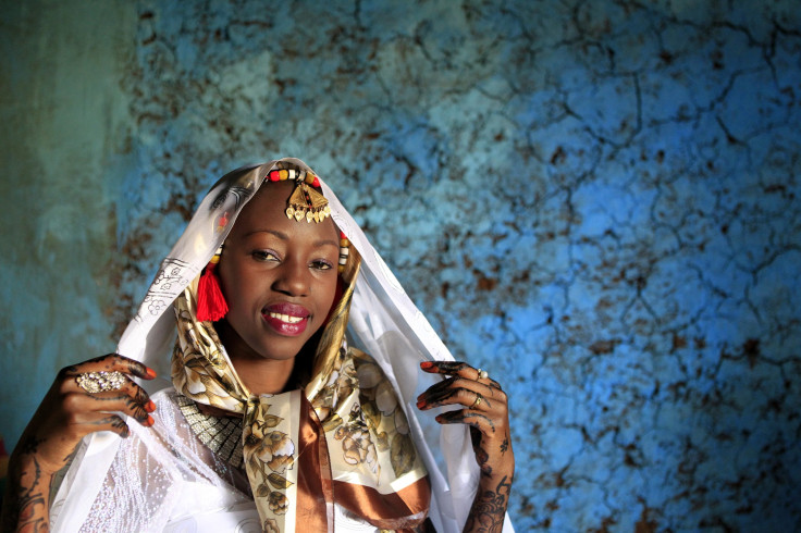 Kenyan bride Hawa Abdulkadir poses for a photograph during her traditional Nubian wedding ceremony in Nairobi's Kibera Slum. 