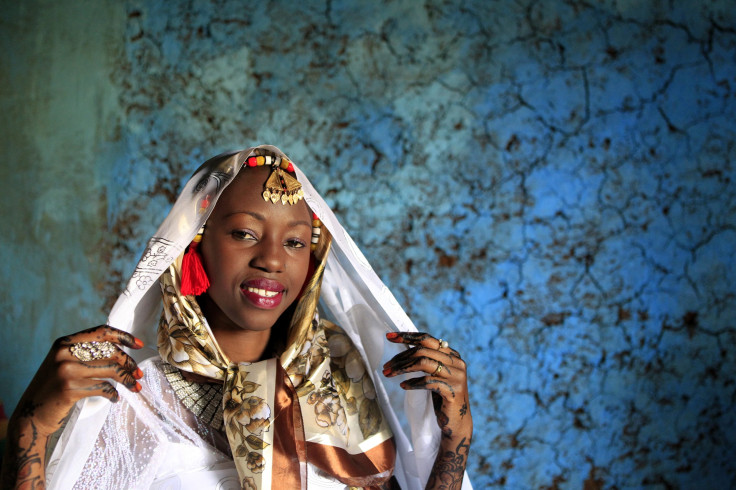 Kenyan bride Hawa Abdulkadir poses for a photograph during her traditional Nubian wedding ceremony in Nairobi's Kibera Slum.