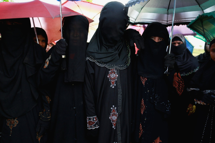 A Rohingya Muslim bride (C) is seen during her wedding ceremony in Kyukpannu village in Maungdaw, the northern Rakhine state.