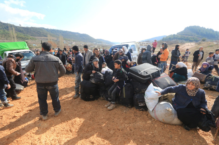 Syrian forces wait near the Syrian-Turkish border