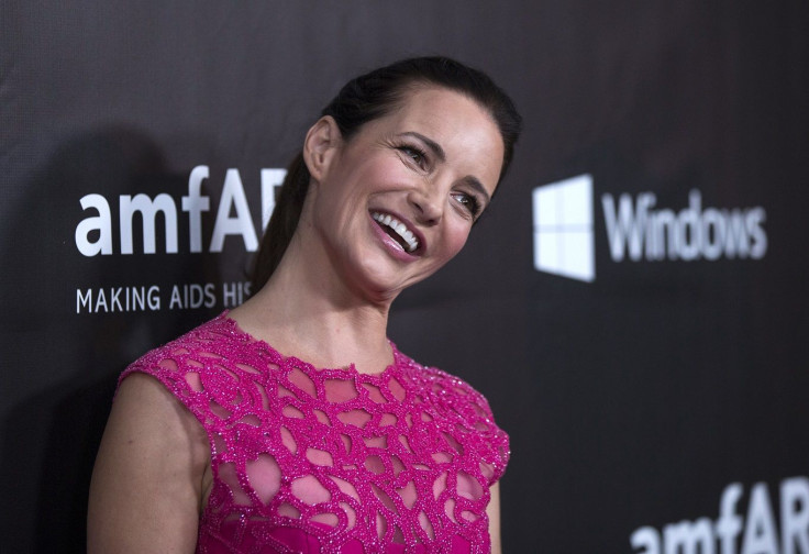 Actress Kristin Davis poses at amfAR's Fifth Annual Inspiration Gala in Los Angeles, California October 29, 2014.