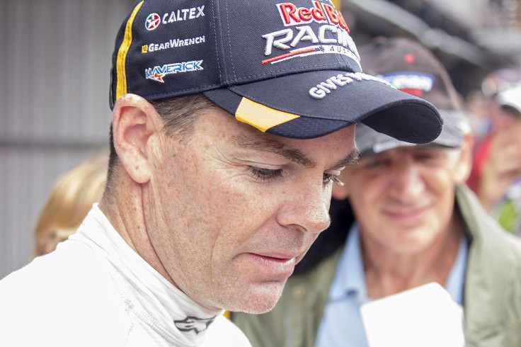 Craig_Lowndes_signing_autographs_during_the_2014_V8_Supercars_Test_Day_(1)