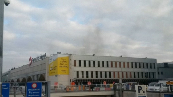 Black smoke is seen rising from the Brussels airport following explosions, in this still image made available March 22, 2016.